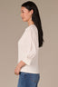 Off White Three Quarter Puff Drop Shoulder Sleeve Mandarin Collar Split V-Placket Mixed Media Knit Top
