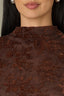Chocolate Truffle Sleeveless Cinched Armholes Mock Neck Textured Design Shirttail Hem Knit Top