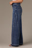 Mid Blue Skyrise Diagonal Fray Panel Acid Wash Released Hem Strings Broken Yoke Wide Leg Contour Shape Technology Jean
