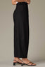 Black Contour Shape Technology Ultra Skyrise Angled Dart Seams Buttoned Patch Pocket Pleated Relaxed Petite Barrel Leg Trouser