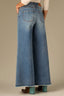 Mid Blue Artisanal Denim Contour Shape Technology Skyrise Round Up Yoke Front Center Seam Fray Hem Wider Leg Jean