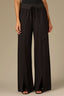 Black Luxe Leisure Skyrise Pull-On Elastic Waist Curved Flap Pocket Seaming Detail Front Slit Hem Wide Leg Glider Pant
