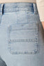 Light Blue Denim Contour Shape Technology Skyrise Angled Dart Seams Curved Front Pockets Whiskering Fading Wide Tulip Hem Whitney Wide Leg Jean