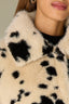 Birch Black Spots Cinched Blouson Raglan Sleeve Collar Neck Snap Button Front Side Pockets Cow Print Straight Cinched Hem Faux Fur Bomber Jacket