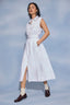 Optic White Denim Sleeveless Cuffed Armhole Button Down Waist Tie Collar Double Breast Pocket Seaming Detail Midi Hem Dress 