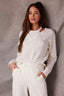 Off White Long Banded Drop Shoulder Sleeve Round Twofer Style V-Neck Cable Stitch Design Banded Lettuce Hem Sweater