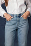 Light Blue Artisanal Denim Contour Shape Technology Skyrise Rhinestone Raw Hem Strings V-Yoke Bennett Barely Boot Jean