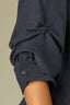 Carbon Blue Below Elbow Puff Pleated Sleeve Buttoned Cuffs Collar Neck Button Down Front Pleats Cinched Back Double Peplum Hem Woven Suede Top