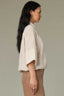 Pale Stone Elbow Wide Cuff Sleeve Collar Neck Button Down Front Contrast Seaming Cinched Bubble Hi-Low Hem Woven Top