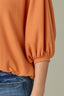Roasted Carrot Seamless Blouson Cinched Cuff Sleeve V-Neck Center Seam Cased Hem Woven Top