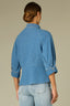 Mid Blue Three Quarter Buttoned Cuff Dolman Sleeve Collar Neck Button Down Front Seaming Peplum Hem Denim Top