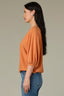 Roasted Carrot Seamless Blouson Cinched Cuff Sleeve V-Neck Center Seam Cased Hem Plus Size Woven Top